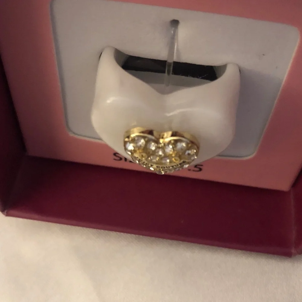 Juicy Couture white pearlescent